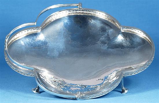 A George V Arts & Crafts silver shallow basket, by Albert Edward Jones, width 277mm, weight 13oz/405grms.